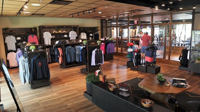 the monster golf pro shop apparel on display around the store